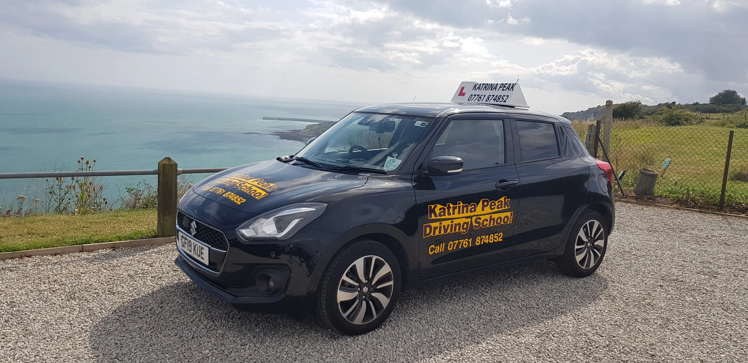 The Katrina Peak Driving School car parked overlooking the Kent coast